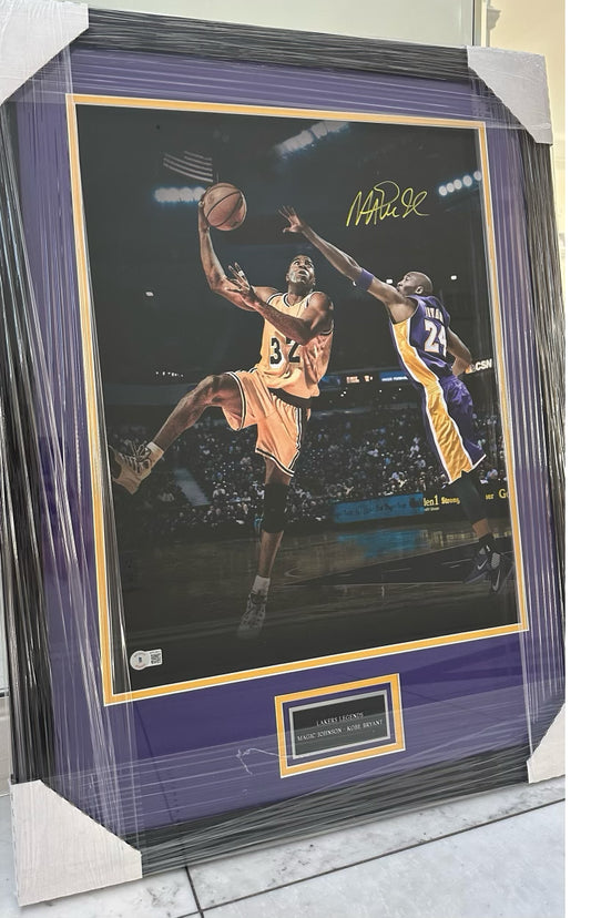 Lakers Magic Johnson Autographed Photo vs. Kobe Bryant Authenticated by Beckett